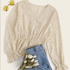 V-neck peplum blouse